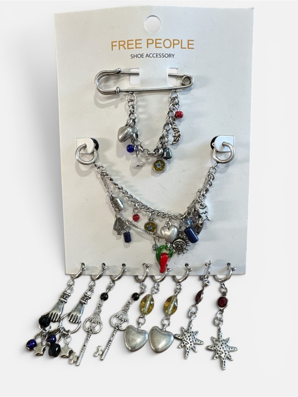 Free People Silver Multi‑Charm Shoe Set with Red, Blue, Green Accents